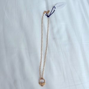 Gold Necklace With a Rose Charm